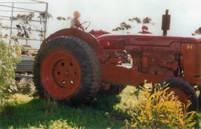 Kid on a old tractor